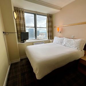 Kamer met een Queen Size Bed